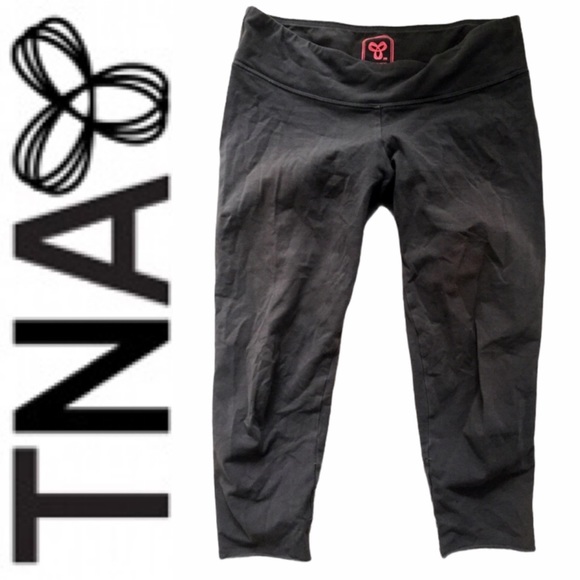 TNA Pants - ARITZIA TNA grey crop leggings with pink logo sz M